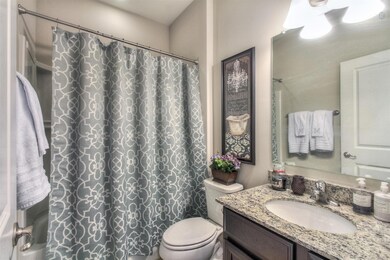Every bath includes tile flooring and granite countertops.