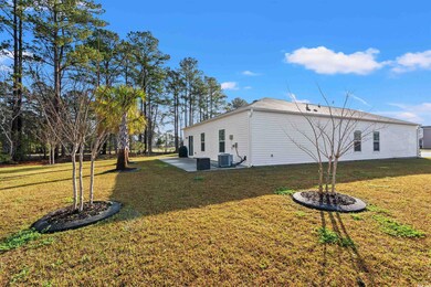 View of side of property with a patio area, centra