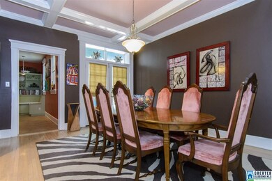 Hardwood floors, recessed lighting, and 10' coffer