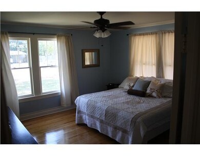 Master Bedroom. MORE NATURAL LIGHT & WOOD FLOORS I