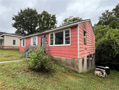 View of front of property with a front lawn