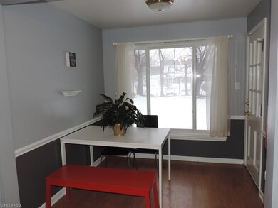 Eating area with access to enclosed porch and over