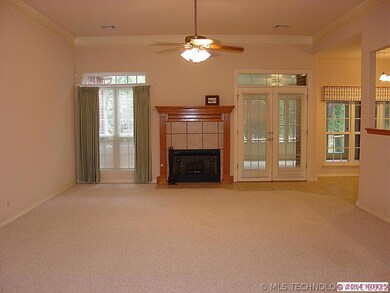 Vaulted Greatroom w/crown moldings.  Opens to brea
