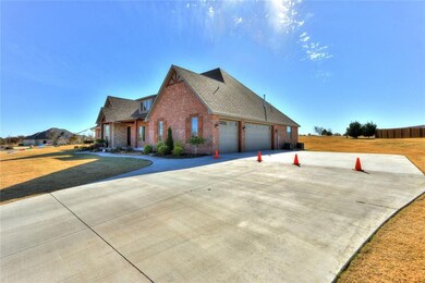 Over-sized 3 car garage with lots of room in the d