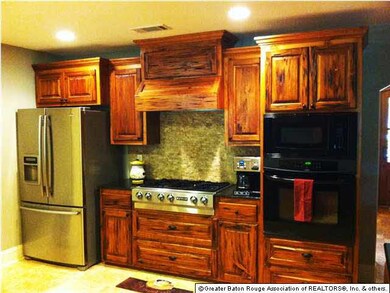 Beautiful Kitchen With Pecky Cypress Cabinets