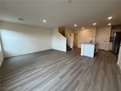 Kitchen with recessed lighting, open floor plan, a