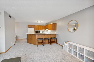 Kitchen boasts raised snack bar...great for families on the go!