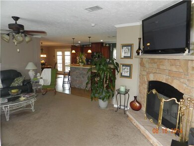 Open Floor Plan. Great for Entertaining. Wood Burning Fireplace. 