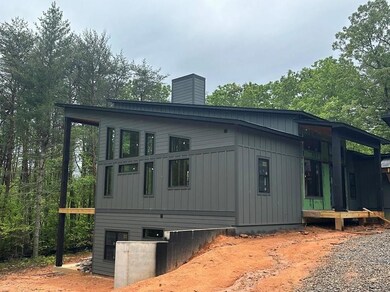 View of home's exterior featuring a chimney