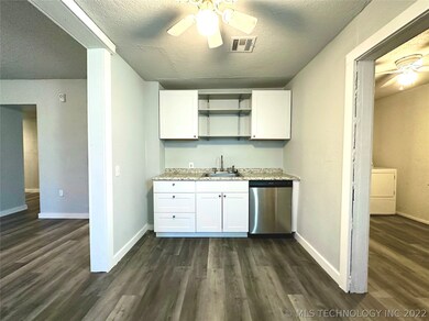 Kitchen also has a dishwasher.