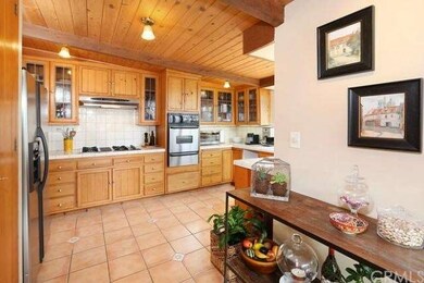 another view of kitchen with beam ceilings