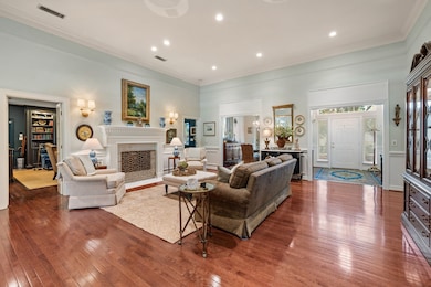 A bright and open formal living room welcomes you into the home.