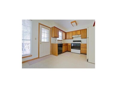 Kitchen includes breakfast eat-in area.  Also lead