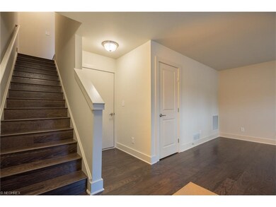 Beautiful hand scraped hardwood floors run through