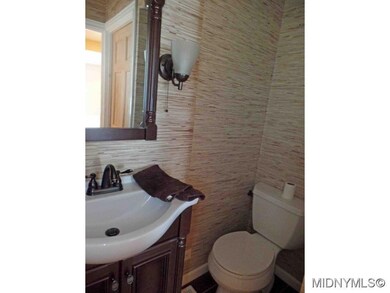 Grass cloth in sleek half bath