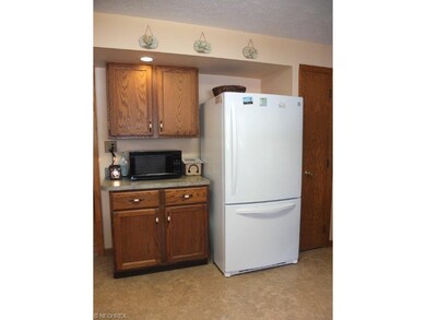 Pantry and plenty of cabinet space in this kitchen