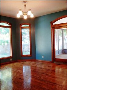 Formal dining offers lots of natural light, wood f