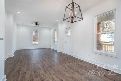 Dining room open to living room and front entrance