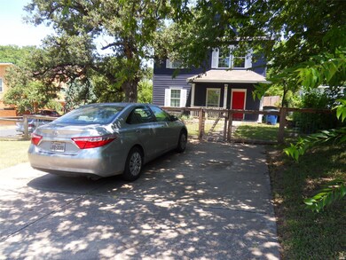 View of front of house featuring a gate