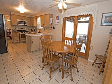 Eat-in fully equipped kitchen with stainless appli
