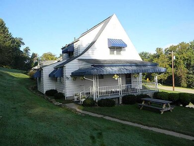 Exterior Back. Big under roof porch is the perfect