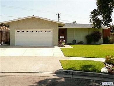 2 car garage and very wide driveway.