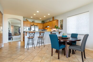 On the go and need a quick bite to eat with your loved ones?  Pull up a seat at the breakfast bar or sit for some quality time in the dining area.