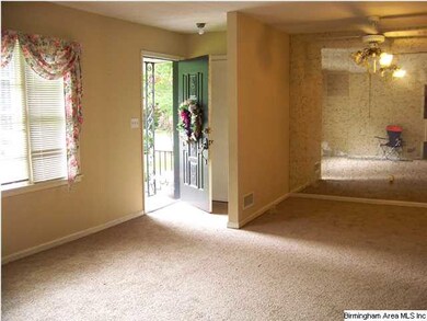 Living Room and dining room with new carpeting and