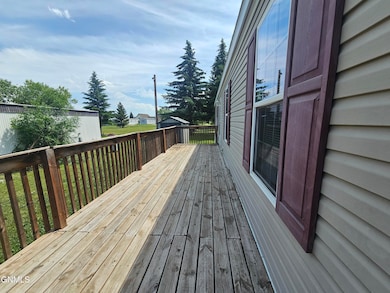 1023 28th St W, Williston, ND 58801 - photo 2