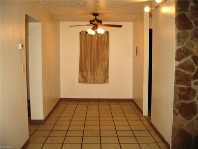 Dining area off kitchen, opens into living room