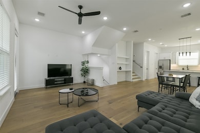 Second floor with open concept living, dining and