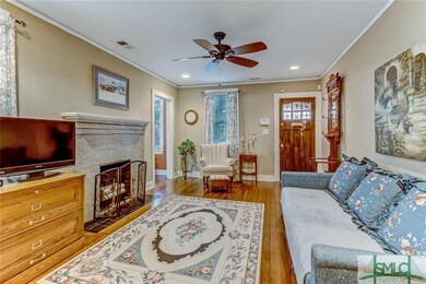 Living Room with original fireplace