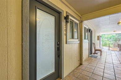 Entrance to property with covered porch