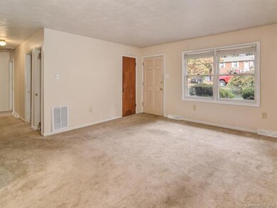 View of the front door from the dining area.