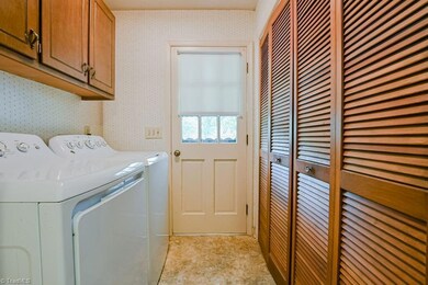 Laundry room with huge pantry closet
