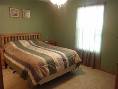 Master bedroom with new carpeting and new ceiling 