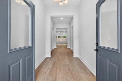 Enter thru long foyer