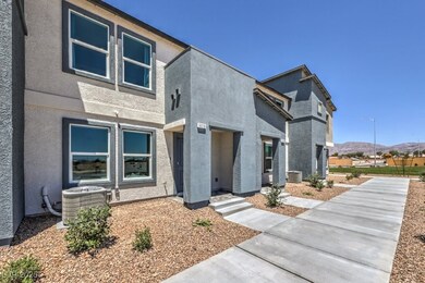 View of front of home with a mountain view and stu