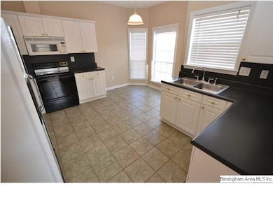 Large spacious kitchen. Eat-in area has bay window