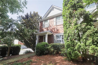 View of front of property with brick siding