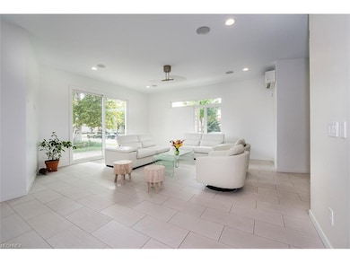 Great room siting area overlooking extra lot which