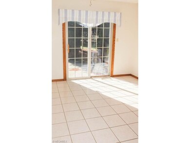 Dinette with slider to back patio.