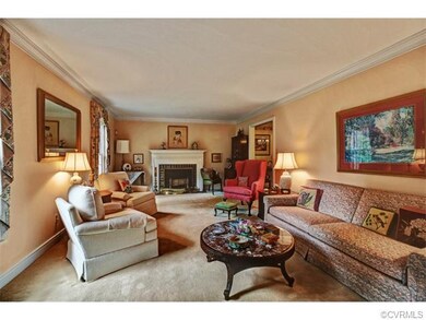Beautiful and spacious living room has a wood burn