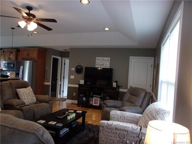 Open floor plan and Tray ceiling in LR,DR and Kitc