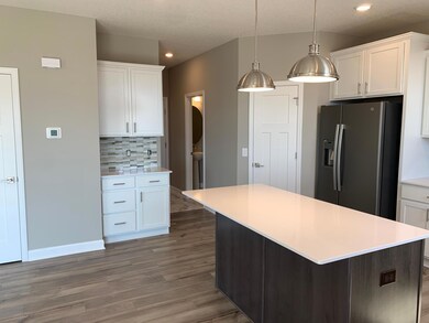 A look at how the mudroom connects to the kitchen for easy access when your carrying your groceries in.
