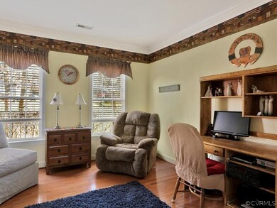 Two windows in living room bring in a lot of light