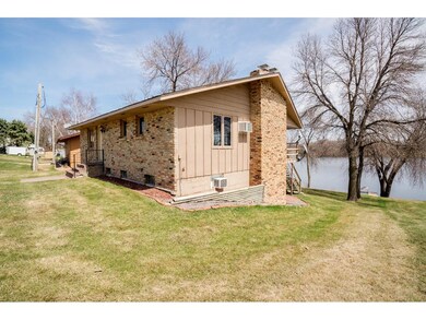 Nice size lot with 58+ feet of sandy Lakeshore.