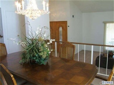 another view of the open living from formal dining