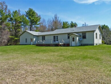 Exterior back of home with spacious...