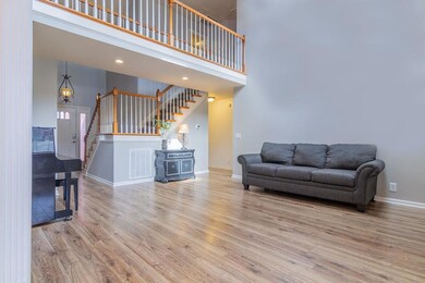 This lets you see the cat walk from the great room side . The high ceilings gives you lots of natural lighting a great wall space to decorate.